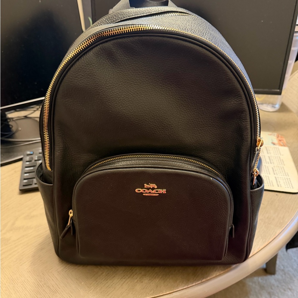 Coach Black Pebbled Leather Backpack with Gold Hardware Accents